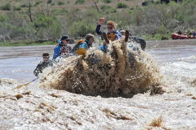 Feel the splash on a guided colorado river rafting trip near moab, paddle class ii rapids, relax with a riverside lunch, and enjoy pickup included for your day.