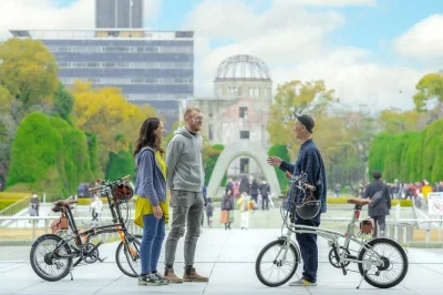 Pedal through hiroshima’s history on a guided cycling tour. visit the peace memorial park, bombed heritage sites, and hear local stories. includes e-bike rental.