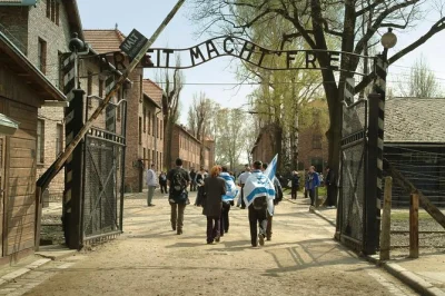 Start in krakow and join a guided day trip to auschwitz-birkenau. walk through the camps, hear survivor stories, and travel with included pickup and return transport.