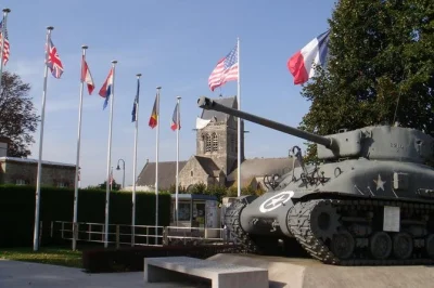 Walk omaha beach, explore pointe du hoc, and visit sainte-mère-Église on a private normandy d-day tour from bayeux with local guide and hotel pickup.