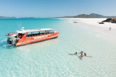 Feel the rush of a high-speed whitsundays cruise, walk barefoot on whitehaven beach, snorkel the great barrier reef, and relax with included lunch and pickup.