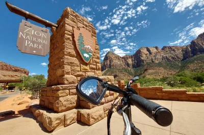 Feel the wind and sun as you e-bike through zion, stopping at iconic spots like court of the patriarchs. includes guide, snacks, helmet, and parking.