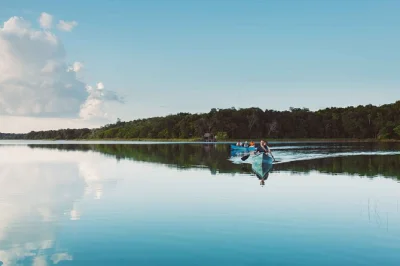 Scopri le antiche rovine di coba in bici, pagaia a punta laguna tra le scimmie e gusta un pranzo tradizionale maya con una famiglia locale. include pick-up in hotel e pranzo.