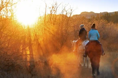 Feel the cool air and watch zion’s cliffs glow on a guided evening horseback ride. includes horses, gear, and local guide. saddle up for sunset magic.
