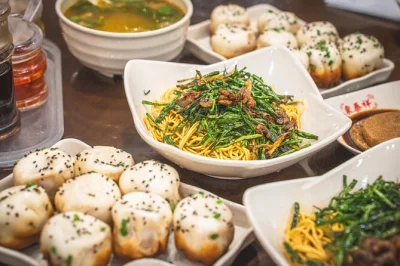 Sample shanghainese pork belly, xiaolongbao & desserts on a guided food tour in the french concession. small group, 10+ tastings, unlimited local drinks included.