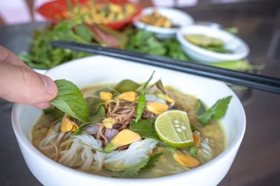 Follow a local guide by tuk-tuk through phnom penh’s lively neighborhoods, tasting classic cambodian dishes, unlimited beer, and meeting family-run eateries. includes pickup.