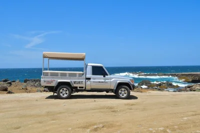 Feel aruba’s wild side on a jeep safari—swim in conchi pool, climb casibari rocks, and catch the breeze at california lighthouse. includes pickup and local guide.