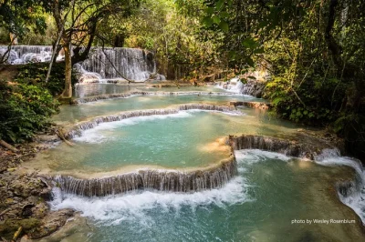 Private full-day tour from luang prabang with kuang si waterfall, ethnic villages, phosi market, and bear sanctuary. includes lunch and local guide.