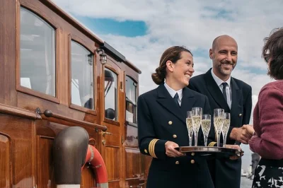 Glide quietly through berlin on a private electric yacht, see the victory column and berlin cathedral, enjoy drinks onboard, and relax with local service included.