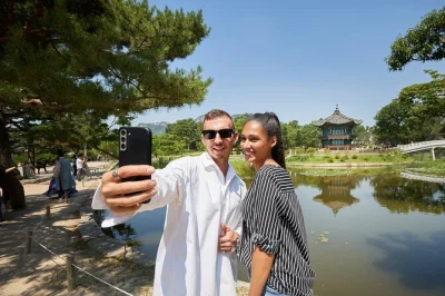 Feel the pulse of seoul on a city tour with palace guards, street food at insadong, cable car views from namsan tower, and easy hotel pickup included.