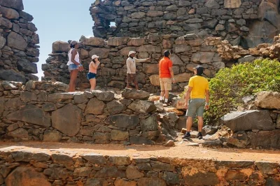 Step into aruba’s colors on a half-day tour with transport, from the butterfly farm to the california lighthouse and natural bridge. includes bottled water and local stories.
