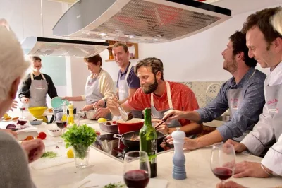 Step inside a 16th-century windmill in palma for a hands-on spanish cooking class, guided by locals, with wine & a shared meal. includes all drinks & food.