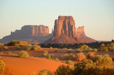 Share a navajo-guided evening in monument valley with backcountry routes, traditional dinner near rain god mesa, and stories by the campfire. includes dinner.