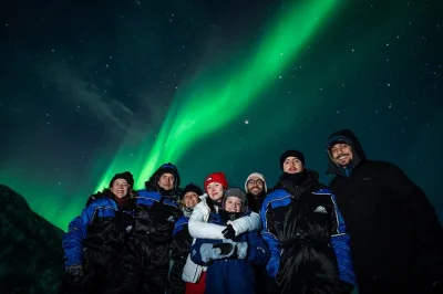 Chase the northern lights in tromsø with real aurora hunters, unlimited mileage, pro photos, and weather-adaptive routes. includes pickup, winter gear, snacks.