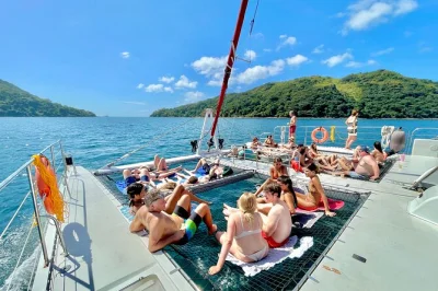 Leave panama city behind for a day trip to taboga island by catamaran—swim in a quiet bay, explore the village, enjoy lunch and an open bar, with crew-led fun included.