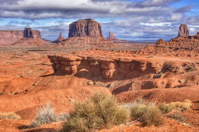 Feel the wind and red dust of monument valley on a 2.5-hour backcountry 4x4 tour with navajo guide, ancient petroglyphs, and arches. includes bottled water & pickup.