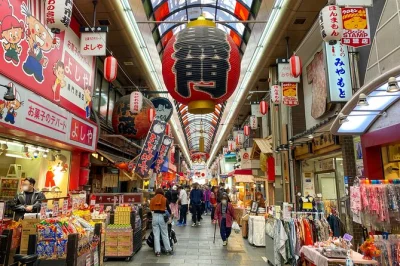 Get swept into osaka’s flavors and street life—sample kuromon market snacks, stroll dotonbori’s neon canal, and share stories with a local guide. all fees included.
