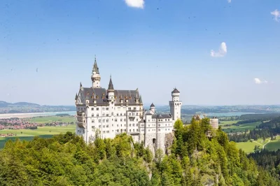 Step inside neuschwanstein castle, wander linderhof’s gardens, and pause in oberammergau village—all with skip-the-line entry, snacks, and a guide from munich.