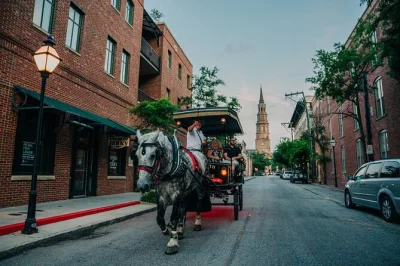 Feel the chill of charleston’s haunted streets on a horse-drawn carriage tour with ghost stories, graveyards, and the city’s old dungeon—includes certified guide.