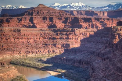 Feel the edge of canyonlands from moab on a 4x4 day trip—petroglyphs, white rim, musselman arch, and shafer trail climbs. includes guide & cold water.