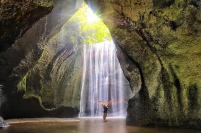 Stumble into bali’s wild side—swim at tibumana, wander tukad cepung’s cave, and feel tegenungan’s spray. private tour with lunch and hotel pickup included.