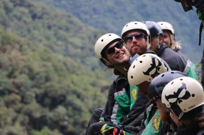 Ride bolivia’s death road from la paz with expert guides, all safety equipment, breakfast, snacks, and a jungle buffet lunch. includes transport and pool access.