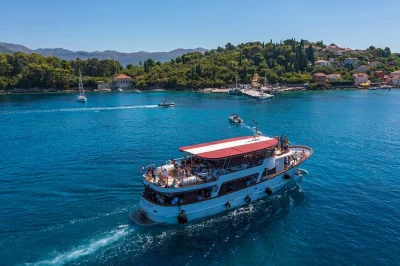 Set sail from dubrovnik to the elaphiti islands, swim in clear adriatic waters, taste dalmatian lunch with wine, and explore villages—includes pickup.