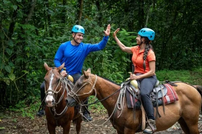 Feel the rush in la fortuna with ziplining, waterfall rappel, horseback riding, and a visit to the maleku village. includes hotel pickup and local lunch.