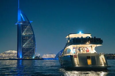 Step onto a dubai yacht cruise with bbq lunch, skyline views, and local crew. sail past burj al arab, palm jumeirah, bluewaters. includes soft drinks & pickup.