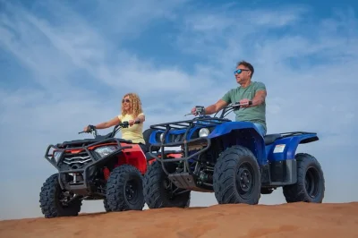 Feel the thrill of dubai’s red dunes with quad biking, sand boarding, and a sunset bbq dinner. includes hotel pickup, live shows, and a local guide.