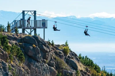 Feel the rush on new zealand’s longest zipline in christchurch, with four lines, chairlift ascent, and local guides. all gear provided—just bring your nerves.