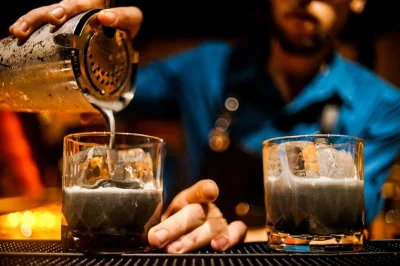 Step through lantern-lit alleys in hoi an, tasting exclusive cocktails in secret bars with a local host. includes 4 drinks, snacks, and mocktail options.