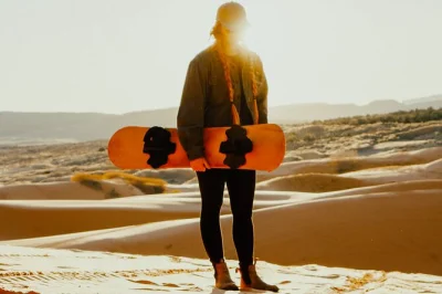 Feel the rush at coral pink sand dunes with a utv ride, slot canyon walk, and sandboarding on star dune—includes bottled water, sandboards, and local guide.