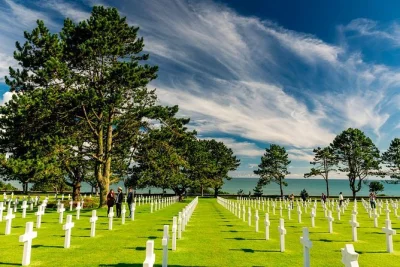 Walk omaha beach, see pointe du hoc’s cliffs, and pause at the normandy american cemetery on this full-day d-day tour with guide and pickup from bayeux.