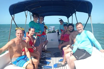 Swim with nurse sharks, rays, and sea turtles at hol chan marine reserve and shark ray alley near ambergris caye. includes snorkeling gear, fruit snack, and early arrival for fewer crowds.