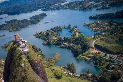 Trade city noise for lakeside colors, local stories, and the climb up el peñol on this guatapé day trip from medellín. includes private transport and snacks.