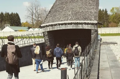 Feel the quiet of dachau memorial before crowds arrive on this early-start half-day tour from munich, with certified guide, all transport, and time for reflection included.
