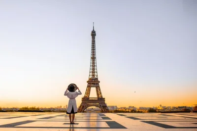 Feel the thrill of climbing the eiffel tower stairs with a guide, pause for paris views, and reach the summit by lift if you choose—includes entry and live commentary.