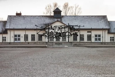 Walk the grounds of dachau concentration camp memorial site with a guide, travel from munich by train, and hear powerful stories. includes return transfers.