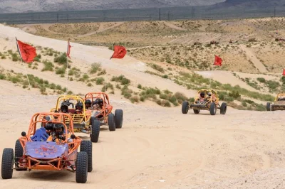 Feel the rush just outside las vegas with a real dune buggy chase, local guide, hotel pickup, and all safety gear included. fast-paced desert adventure awaits.