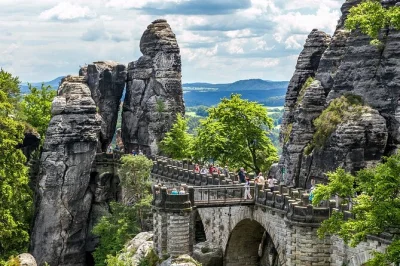 Cross from prague to germany’s bastei bridge, hike to pravcicka gate, and enjoy a czech lunch with a local guide. includes pickup and boat ride in the gorge.