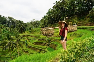 Feel the spirit of ubud on a private day tour—rice terraces, tegenungan waterfall, monkey forest, art villages—with hotel pickup and all entry fees included.