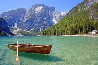 Acorde em veneza, explore cortina d’ampezzo, circule o lago di braies e admire as montanhas dolomitas — tudo com transporte confortável e guia local. inclui busca.