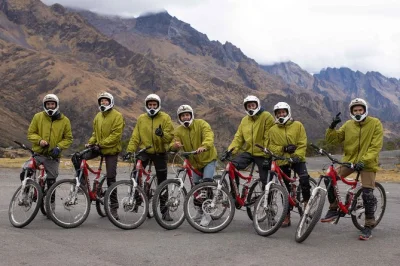 Feel the rush of biking from abra malaga, trek lush inca trails, soak in cocalmayo hot springs, and reach machu picchu with local guides—includes pickup & all gear.
