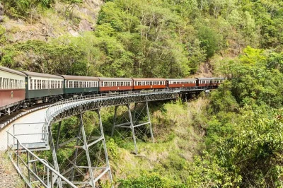 Feel the rainforest come alive on a cairns to kuranda day trip with historic railway, skyrail cableway, and time to wander village markets. includes pickup.