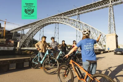 Scopri porto in e-bike con una guida locale: visita ribeira, torre dos clérigos, livraria lello e molto altro. tutto l’equipaggiamento incluso.