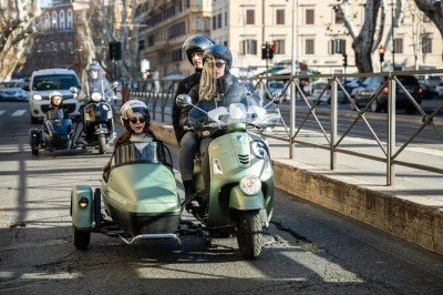 Zip through rome by vespa sidecar, swapping seats at every stop. see the colosseum, aventine hill, trastevere and janiculum with guide, coffee & gelato included.