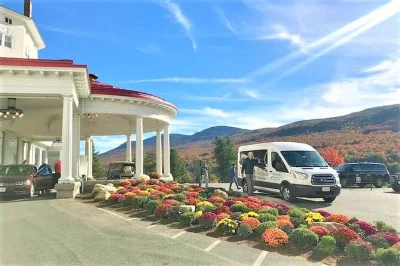 Feel the colors of new hampshire’s white mountains on a fall foliage day trip from boston. includes hotel pickup, scenic stops, local lunch break, and live guide.