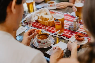 Start hungry in budapest—taste goulash, chimney cake, and regional wines with a local guide. includes market walk or evening food tour, plus lunch and drinks.