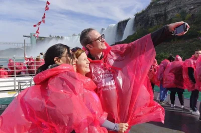 Feel the mist on a niagara falls day trip from toronto with hornblower boat cruise, riverside stops, and time in niagara-on-the-lake. includes hotel pickup.